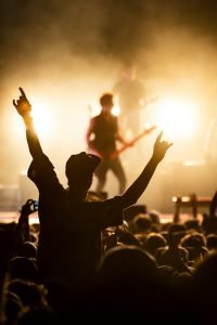 A music fan enjoying a rock concert